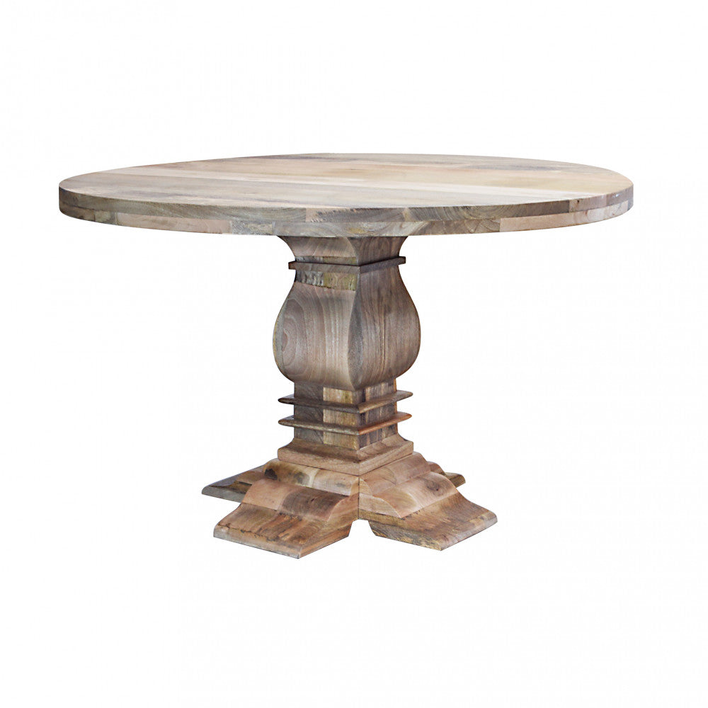 Table d'intérieur ronde Ø130 cm en bois de manguier travaillé 