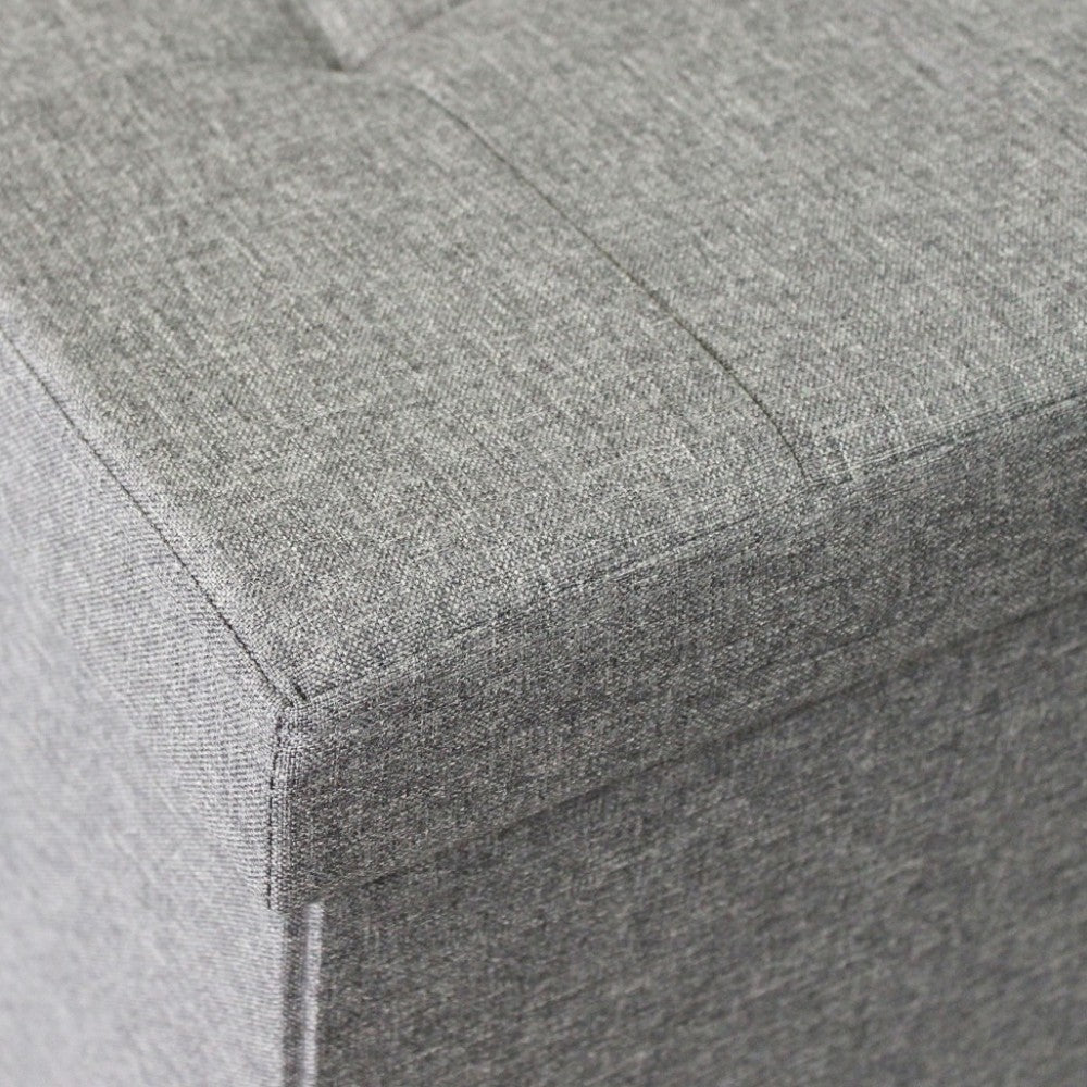 Pouf de rangement rectangulaire en tissu gris