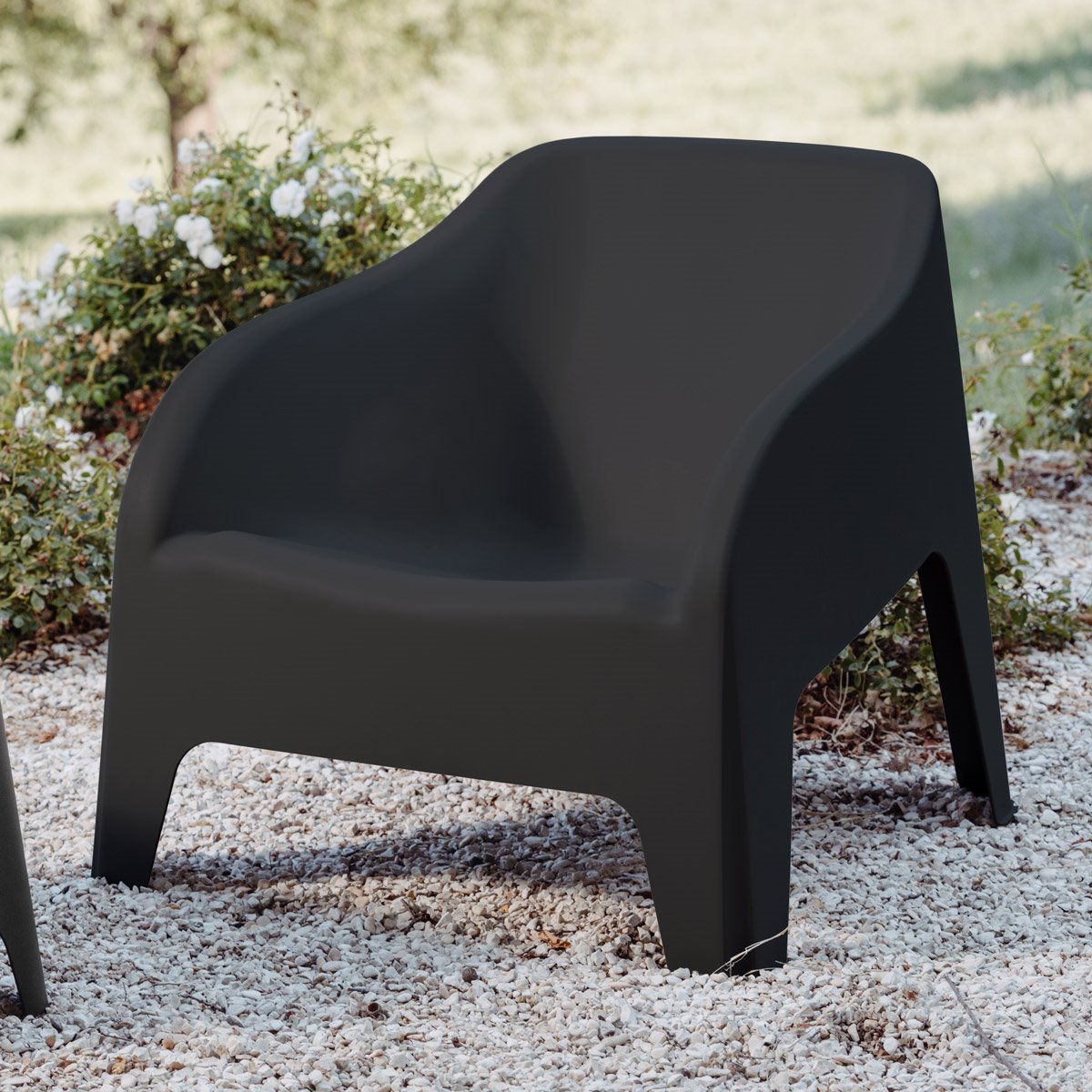 Poltrona elegante in resina da giardino esterno impilabile Toomax Petra